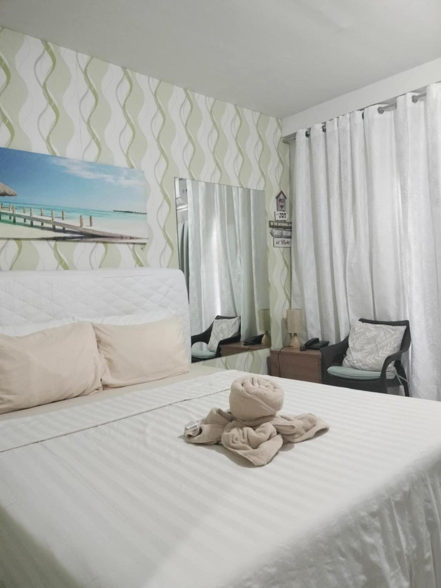 Stay And Fly At Amani Grand Resort Residences Isla de Mactán Exterior foto